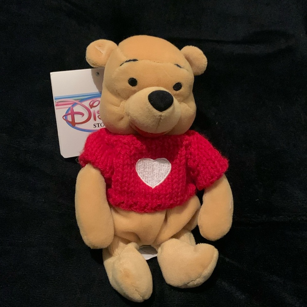 Disney Store Pooh Bear with ❤️ sweater. 7” bean bag.